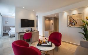 TV a/nebo společenská místnost v ubytování Hotel Royal ASBU Tunis