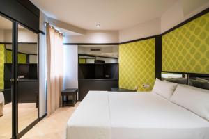 Posteľ alebo postele v izbe v ubytovaní Hotel Punt 14