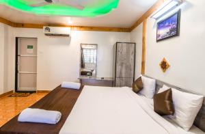 Postel nebo postele na pokoji v ubytování Saga Resort