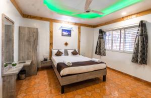 Postel nebo postele na pokoji v ubytování Saga Resort