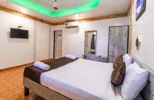 Postel nebo postele na pokoji v ubytování Saga Resort