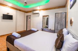 Postel nebo postele na pokoji v ubytování Saga Resort