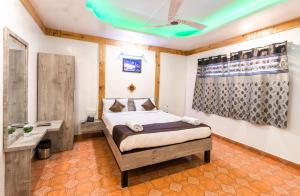 Postel nebo postele na pokoji v ubytování Saga Resort