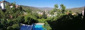 Una vista de la alberca en Villa Spa Los Villares o alrededores
