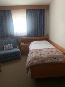 Cama o camas de una habitación en Hotel Cime Bianche
