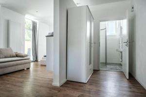 A bathroom at Loft mit großer Terrasse bei der Kinderklinik 2C