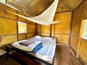 Кровать или кровати в номере Twin Hut