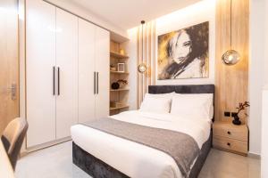 Posteľ alebo postele v izbe v ubytovaní F & B Collection - City Central 2 Bedroom Suite