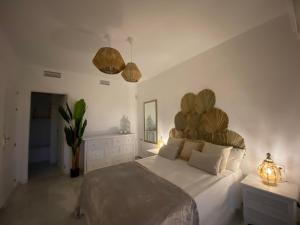 Postel nebo postele na pokoji v ubytování Apartamentos Costa Quebrada + 37 fotografií