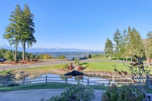 a view of a golf course with a pond at Alderbrook A-Frame in Union