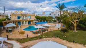 an aerial view of a villa with a swimming pool at Ras Katy Sunset Views in Sharm El Sheikh