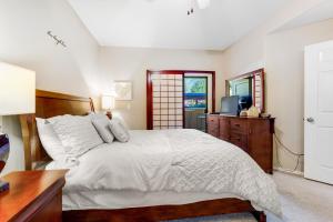 Ένα ή περισσότερα κρεβάτια σε δωμάτιο στο Desert Breeze Villas #137 +17 φωτογραφίες