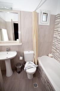 Koupelna v ubytování Kalydna Island Hotel