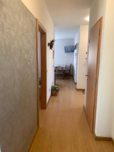A bed or beds in a room at Angeli Dolomiti House2