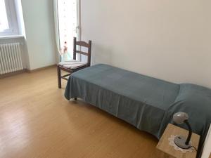 A bed or beds in a room at Angeli Dolomiti House2