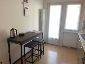 A kitchen or kitchenette at Angeli Dolomiti House2