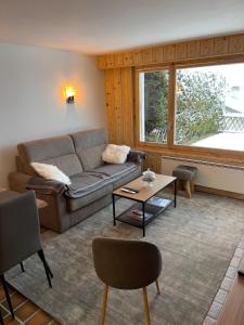 Posezení v ubytování Superbe appartement avec vue et parking gratuit