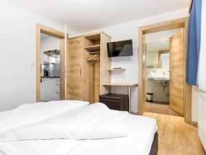 A bed or beds in a room at Apart Corona