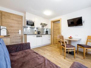 A kitchen or kitchenette at Apart Corona