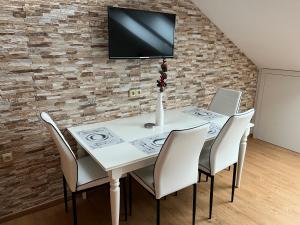 TV a/nebo společenská místnost v ubytování Apartmán U Póla