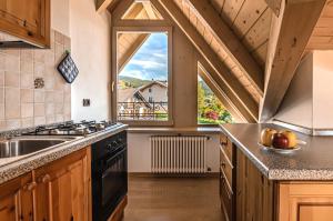 Kuchyň nebo kuchyňský kout v ubytování Agritur Cristina + 37 fotografií