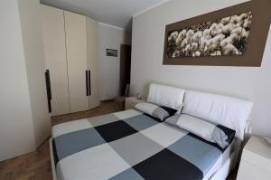 Postel nebo postele na pokoji v ubytování Guest House Felice - VDA Verrès 0008
