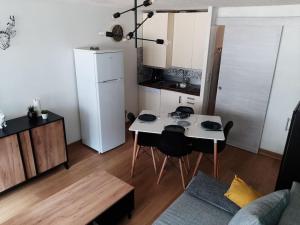 Kuchyňa alebo kuchynka v ubytovaní Saint lary soulan village T2 Avec parking