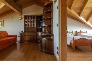 A bed or beds in a room at Agritur Cristina
