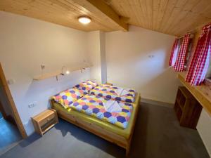 Postel nebo postele na pokoji v ubytování Apartmány Pod Kopcem