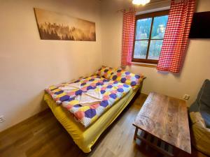 Postel nebo postele na pokoji v ubytování Apartmány Pod Kopcem