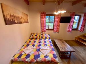 Postel nebo postele na pokoji v ubytování Apartmány Pod Kopcem