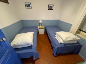 A bed or beds in a room at Maison de l´amitié Homps