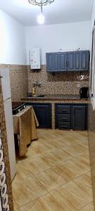 A cozinha ou cozinha compacta de luxe appartement Nour D'asilah 3 Free WiFi 5G