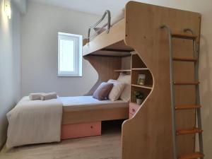 Katil atau katil-katil dalam bilik di Palmera Apartment