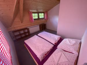Postel nebo postele na pokoji v ubytování Apartmány Pod Kopcem