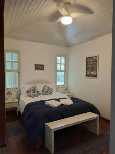 Cama ou camas em um quarto em Pousada Ribeirao da Floresta