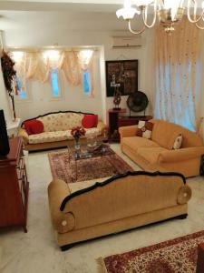 A seating area at Prime Luxury Villa beach front