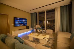 TV a/nebo společenská místnost v ubytování Apartment Riyadh Rafal Tower 93