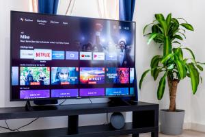 TV a/nebo společenská místnost v ubytování Große 3-Zimmer Wohnung - zentral-Coburg - kostenloser Parkplatz