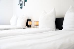 Postel nebo postele na pokoji v ubytování Große 3-Zimmer Wohnung - zentral-Coburg - kostenloser Parkplatz