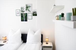 Postel nebo postele na pokoji v ubytování Große 3-Zimmer Wohnung - zentral-Coburg - kostenloser Parkplatz