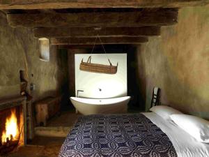 Katil atau katil-katil dalam bilik di Sextantio Albergo Diffuso