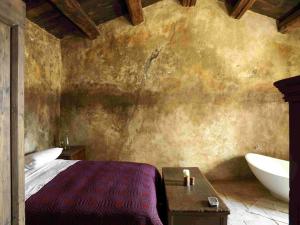 Katil atau katil-katil dalam bilik di Sextantio Albergo Diffuso