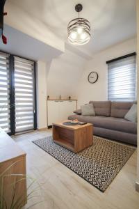 Posezení v ubytování Apartman Maslacak