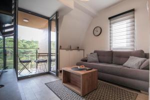 Posezení v ubytování Apartman Maslacak + 33 fotografií