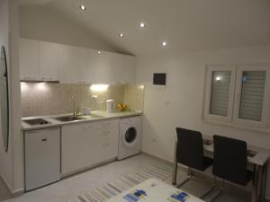 Kuchyňa alebo kuchynka v ubytovaní Apartment Prime Dubrovnik