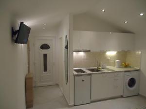 Kuchyňa alebo kuchynka v ubytovaní Apartment Prime Dubrovnik + 23 fotografií