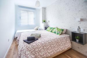 Postel nebo postele na pokoji v ubytování CARTAGENAFLATS, Apartamentos Anfiteatro Romano 4B + 13 fotografií