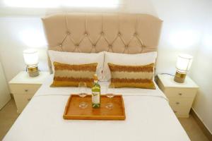 Postel nebo postele na pokoji v ubytování Suite Ejecutiva 2F A 12Min Malecon 2000 GYE