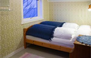 Postel nebo postele na pokoji v ubytování The Lighthouse Keepers House